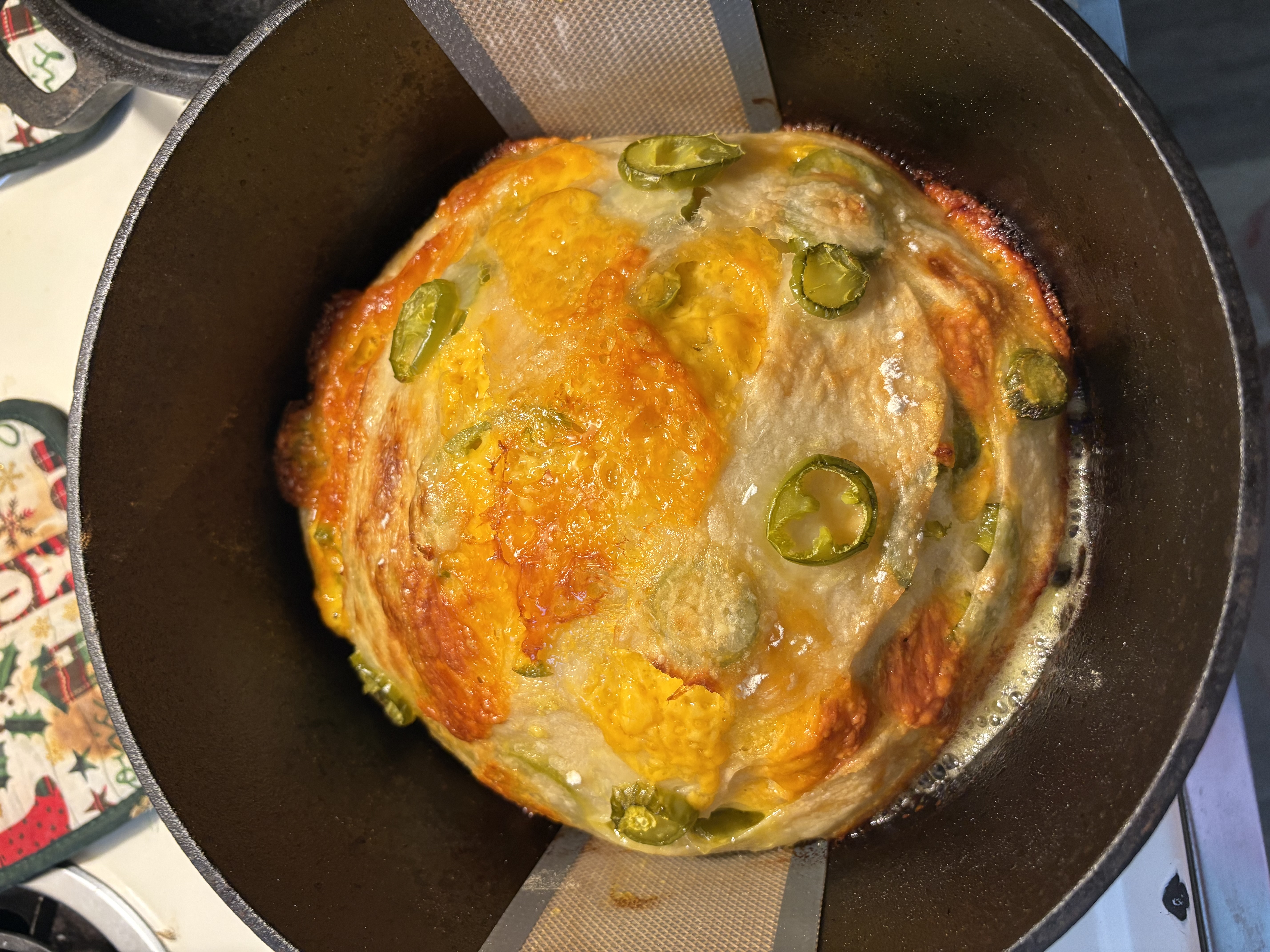 Fresh jalapeño cheddar loaf in the oven